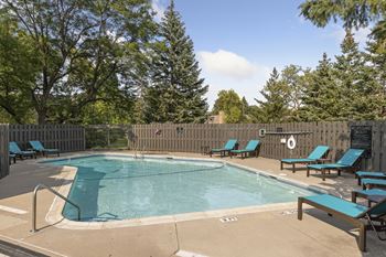 Swimming pool with relaxing sundecks